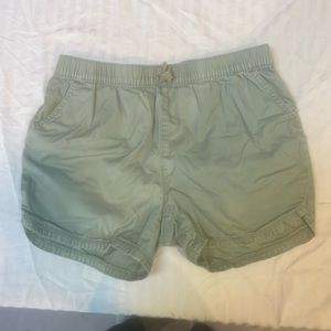 green denim shorts